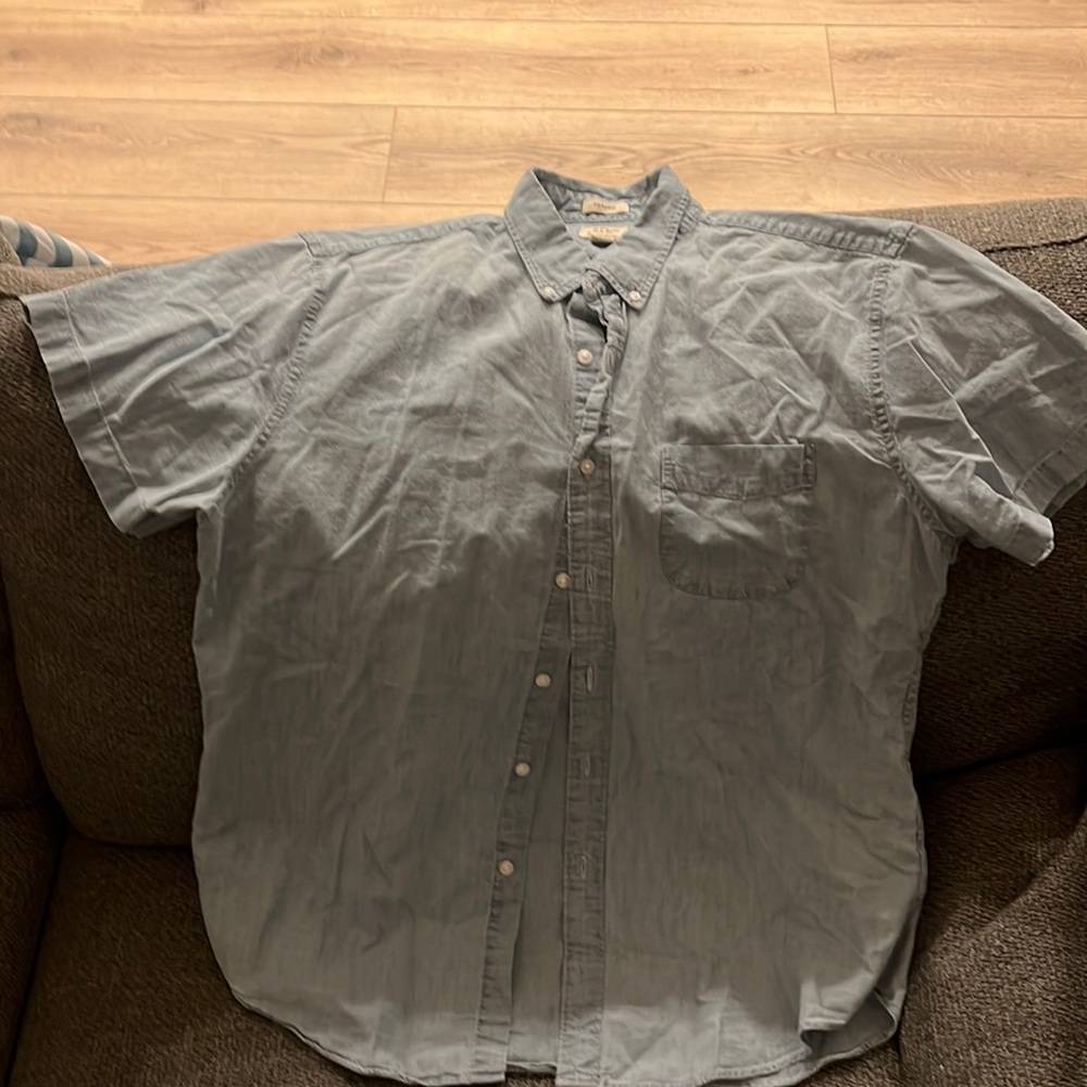 Nice short sleeve button up. Never worn. Too small for husband